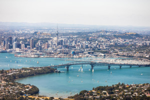 Auckland Aerial View featuring ocean and Harbour Bridge c.ATEED