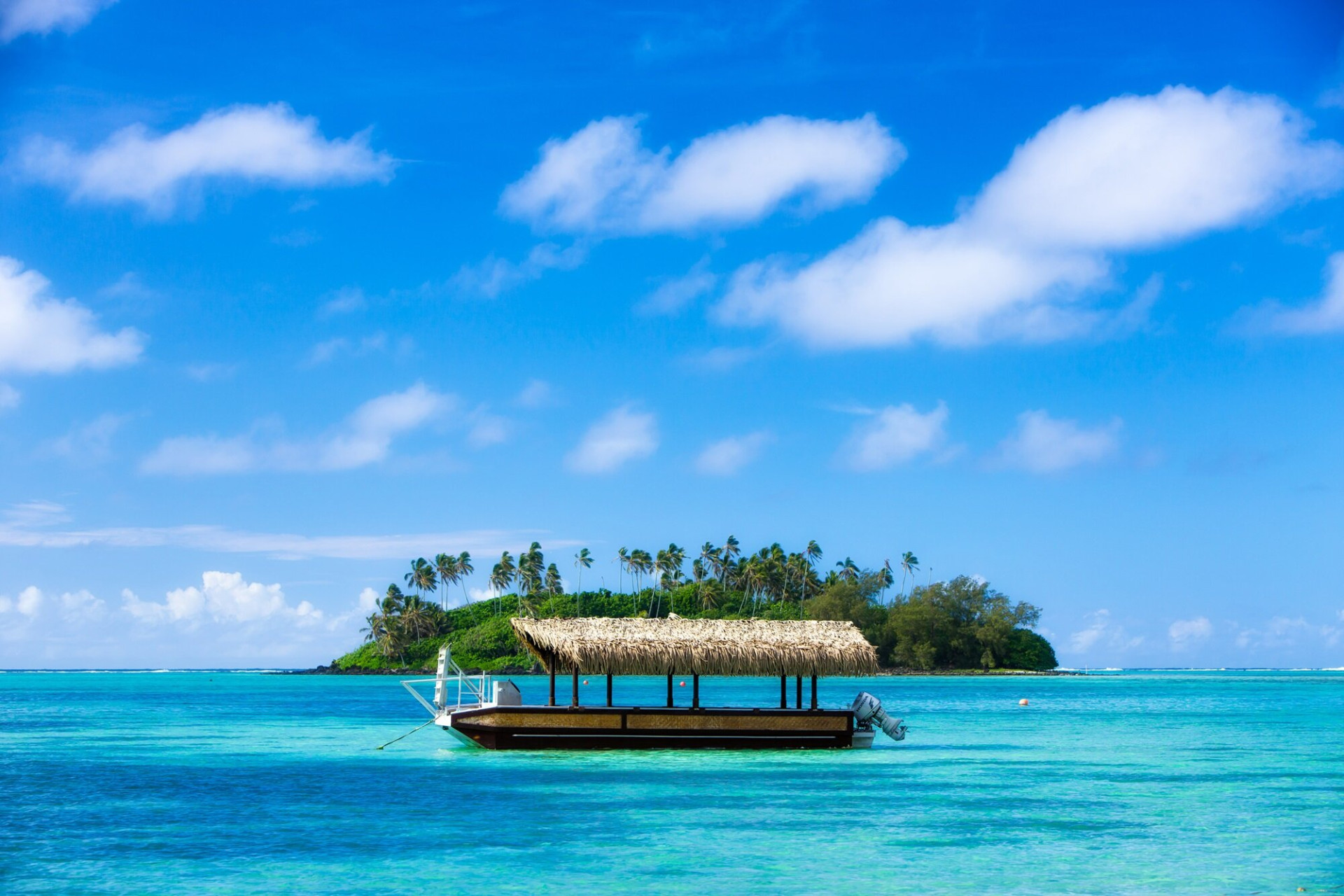 Pacific Resort Rarotonga Boat in lagoon