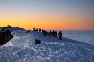 Mount Kilimanjaro hikers at sunrise Tanzania Africa AdobeStock 310814431 web