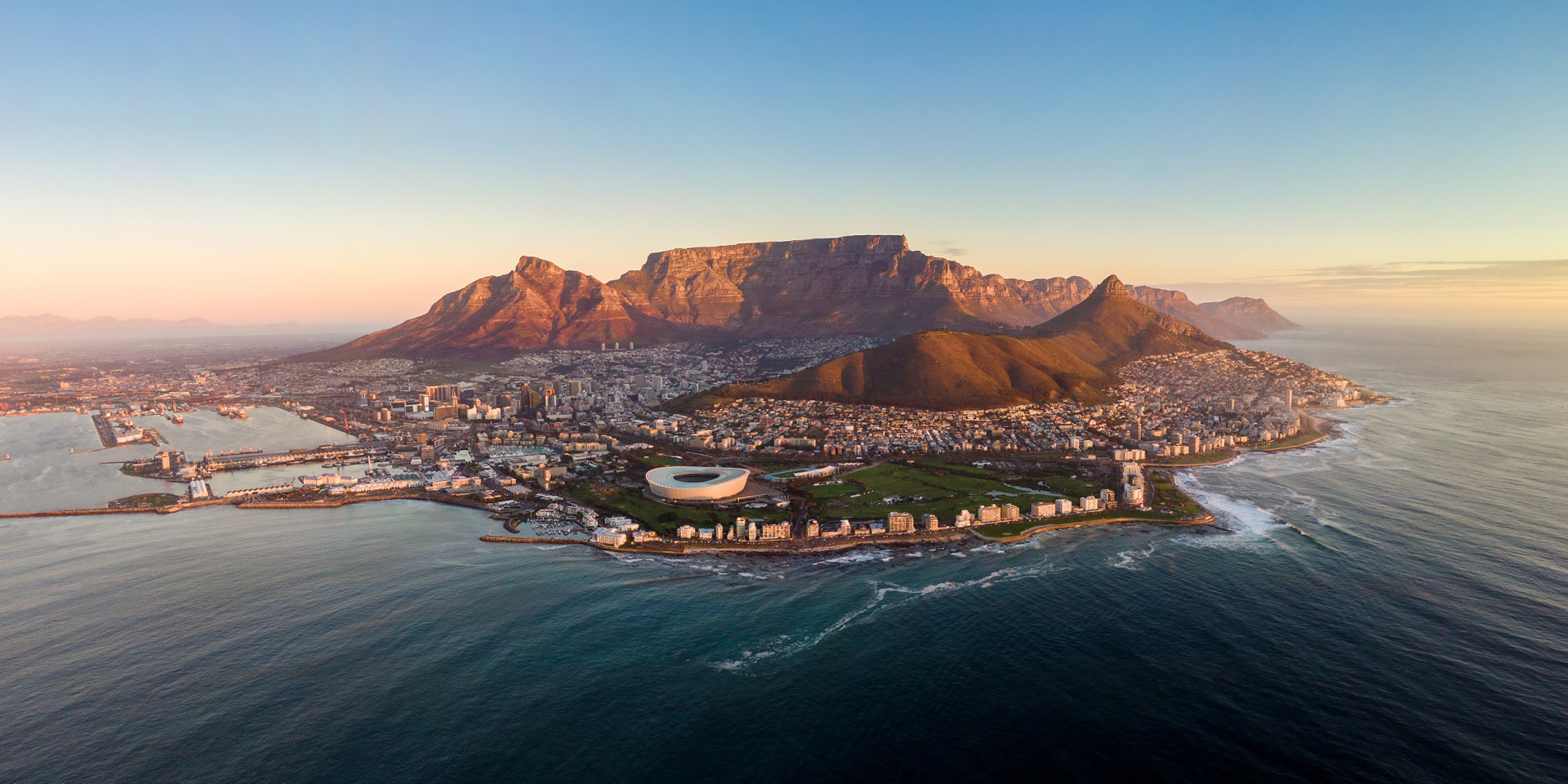 South Africa Aerial Panoramic View of Cape Town at Sunset Table Mountain Western Cape Province iStock 1321344940